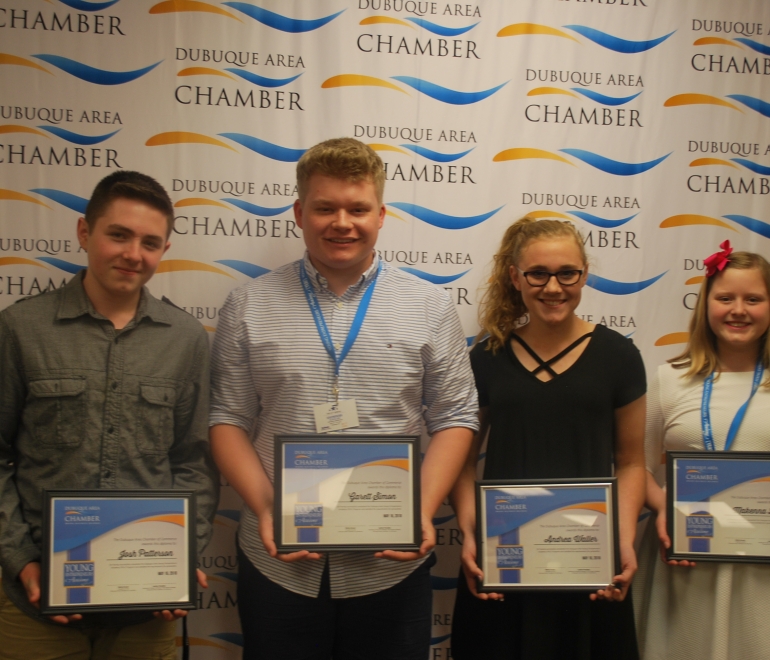 students holding their graduation certificates from the young entrepreneur's academy