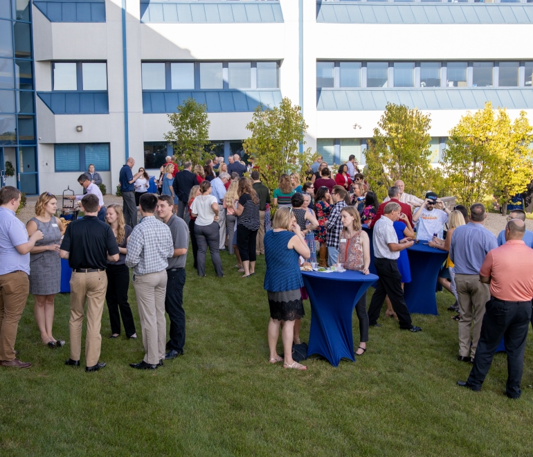 Chamber members gathered at outdoor Business After Hours